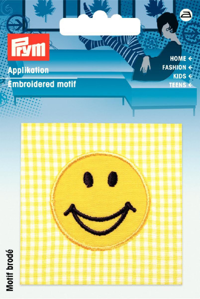 Applikation Smiley auf gelbem/weißem Stoff